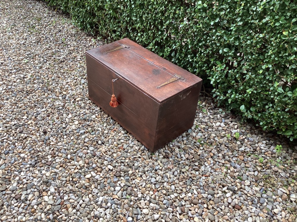 A rectangular dark mahogany wooden bible box featuring brass strap hinges on top and a keyhole with a decorative tassel on the front. View IV