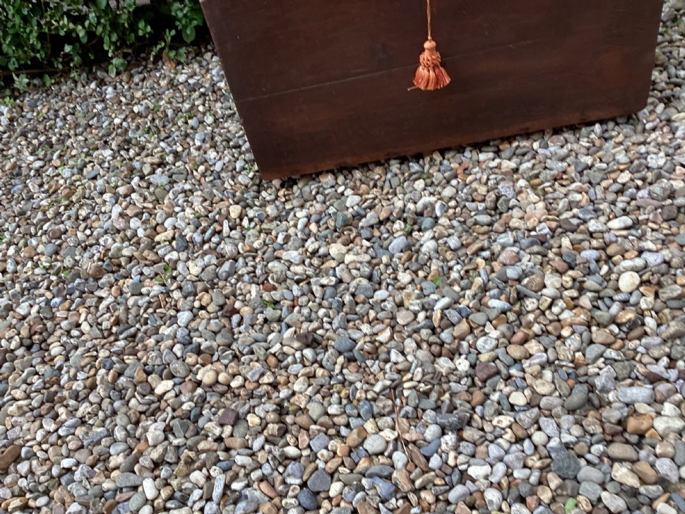 A rectangular dark mahogany wooden bible box featuring brass strap hinges on top and a keyhole with a decorative tassel on the front. View XII