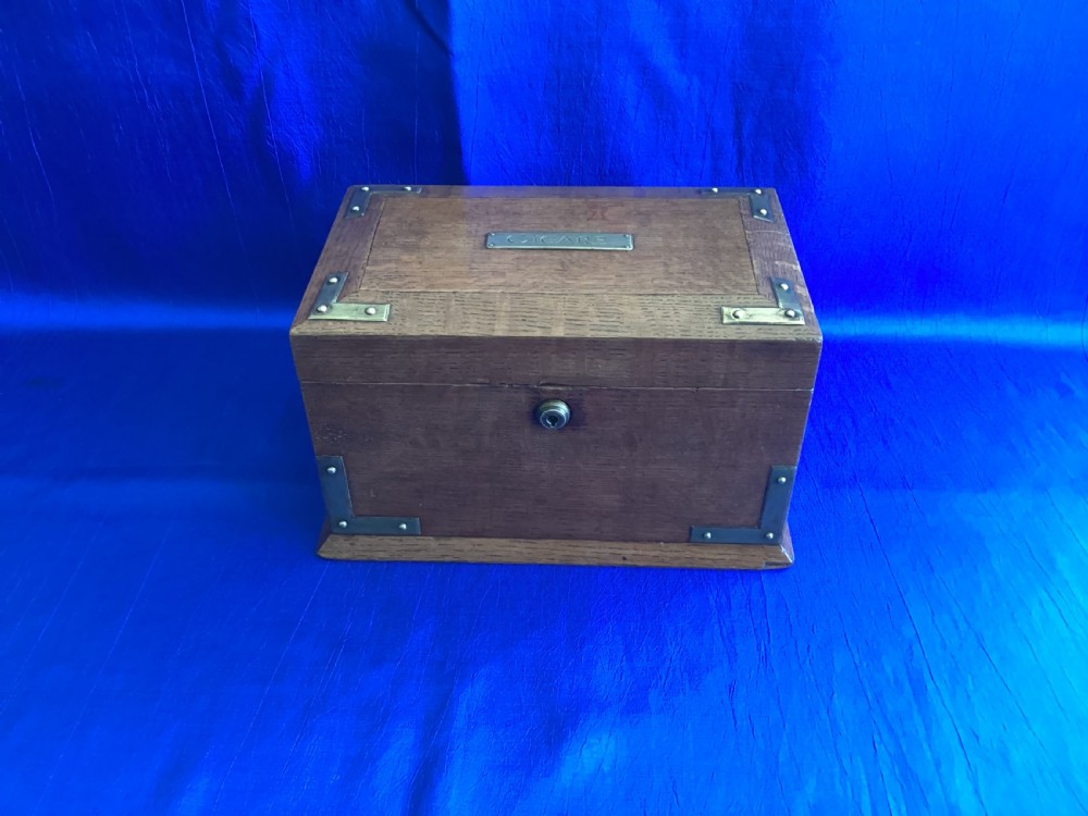 Edwardian brass bound oak cigar cabinet 