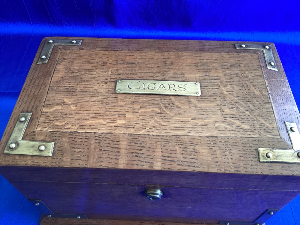 Edwardian brass bound oak cigar cabinet  View IX