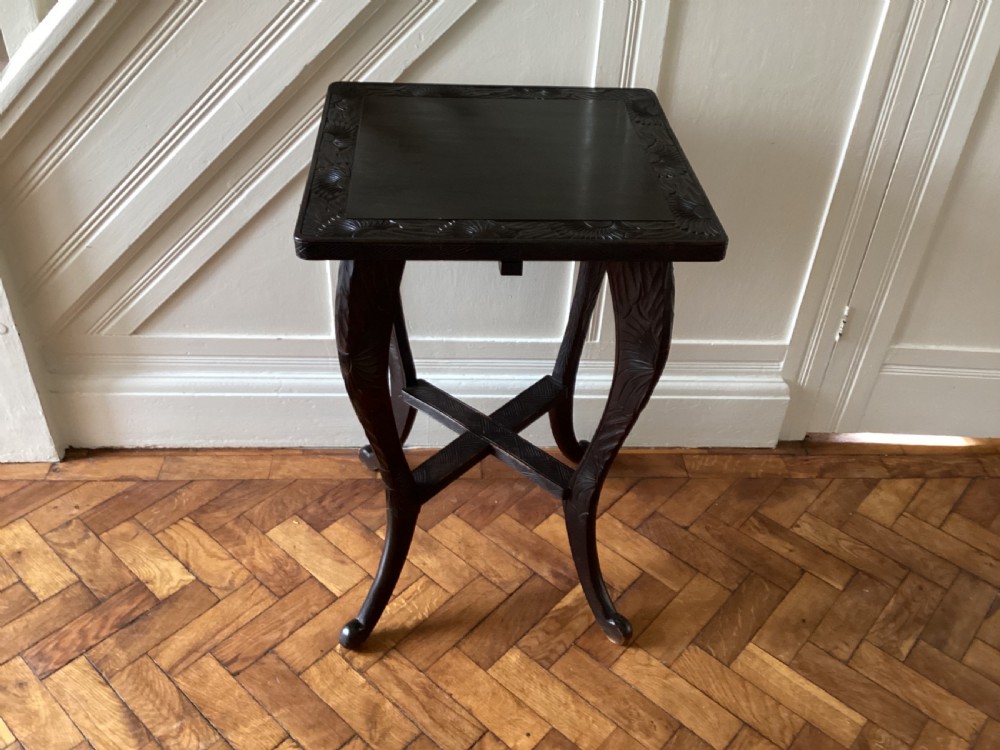 A Liberty and Co Japanese carved side table  View IV