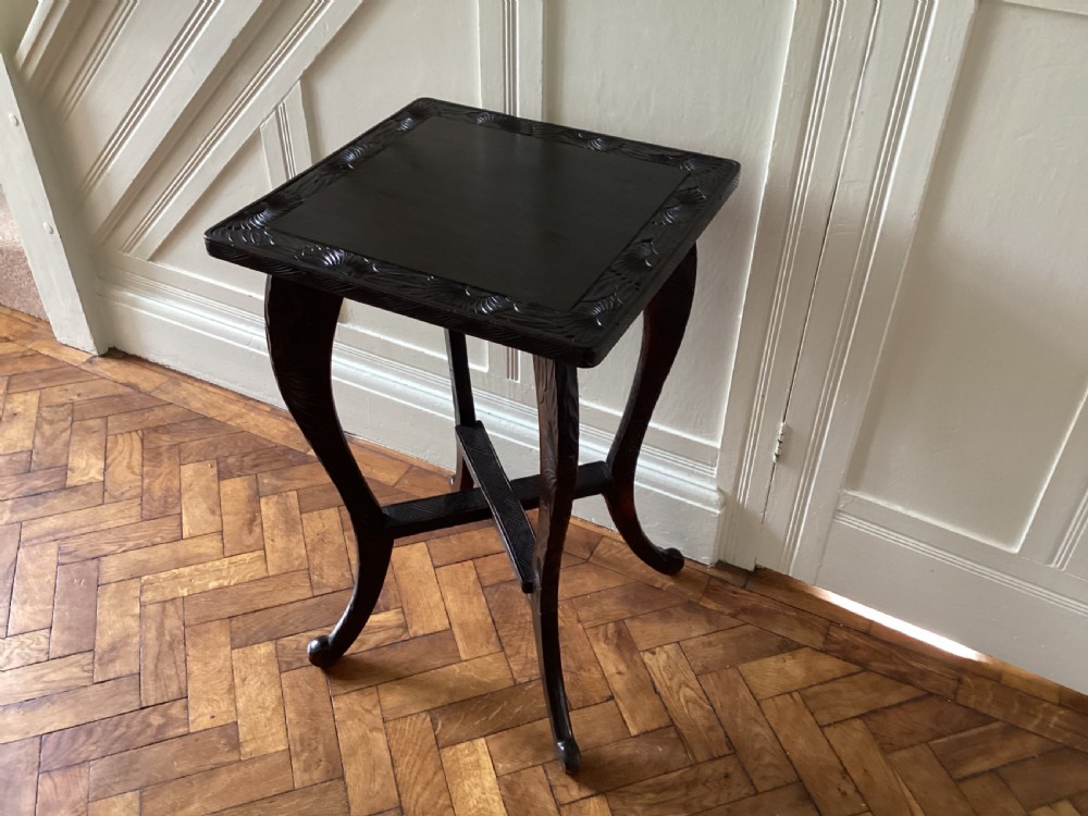 A Liberty and Co Japanese carved side table  View VI