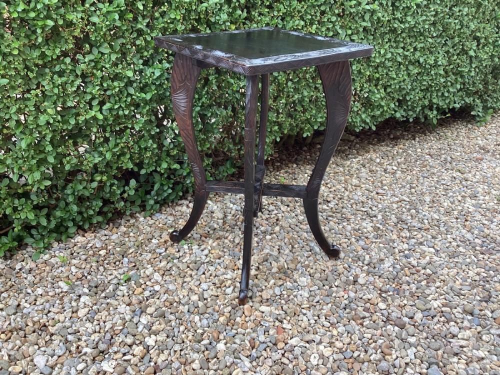 A Liberty and Co Japanese carved side table  View XI