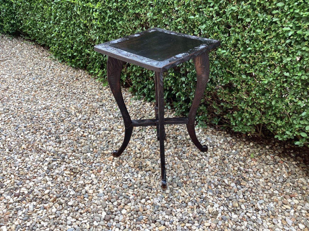 A Liberty and Co Japanese carved side table  View XII