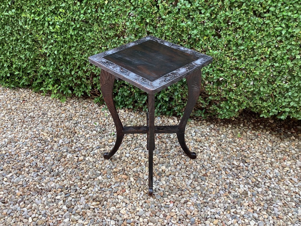 A Liberty and Co Japanese carved side table  View XIII