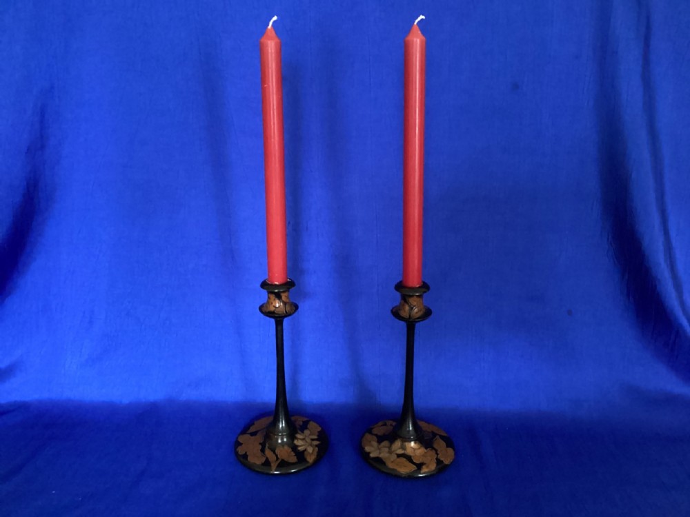 A pair of Art Nouveau carved candlesticks  View II