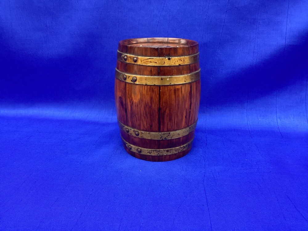 An Edwardian oak coopered barrel money box View II