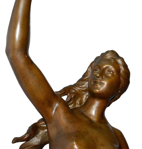 fig 1. A 19th-century patinated bronze sculpture depicting a semi-nude classical maiden holding a mandolin with one arm raised in a dancing motion.
