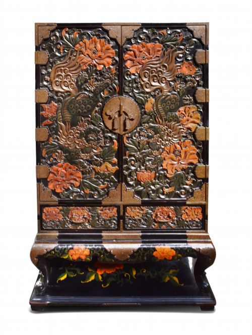 LATE 19TH CENTURY CHINOISERIE CARVED LACQUER CABINET ON STAND