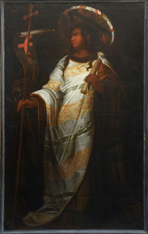 fig 2. A pair of full-length 18th-century oil paintings depicting classical female figures in draped ochre gowns within matching carved gilt frames.