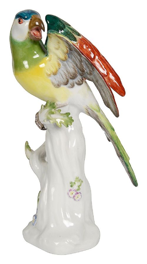 A late 19th-century Meissen hard-paste porcelain figurine depicting a brightly enamelled parrot perched on a tree stump base. View II