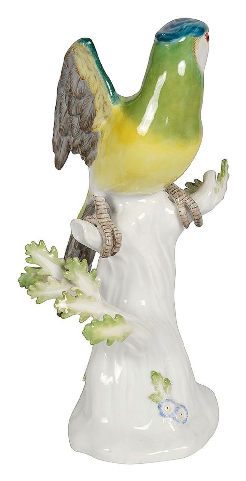 A late 19th-century Meissen hard-paste porcelain figurine depicting a brightly enamelled parrot perched on a tree stump base. View VI