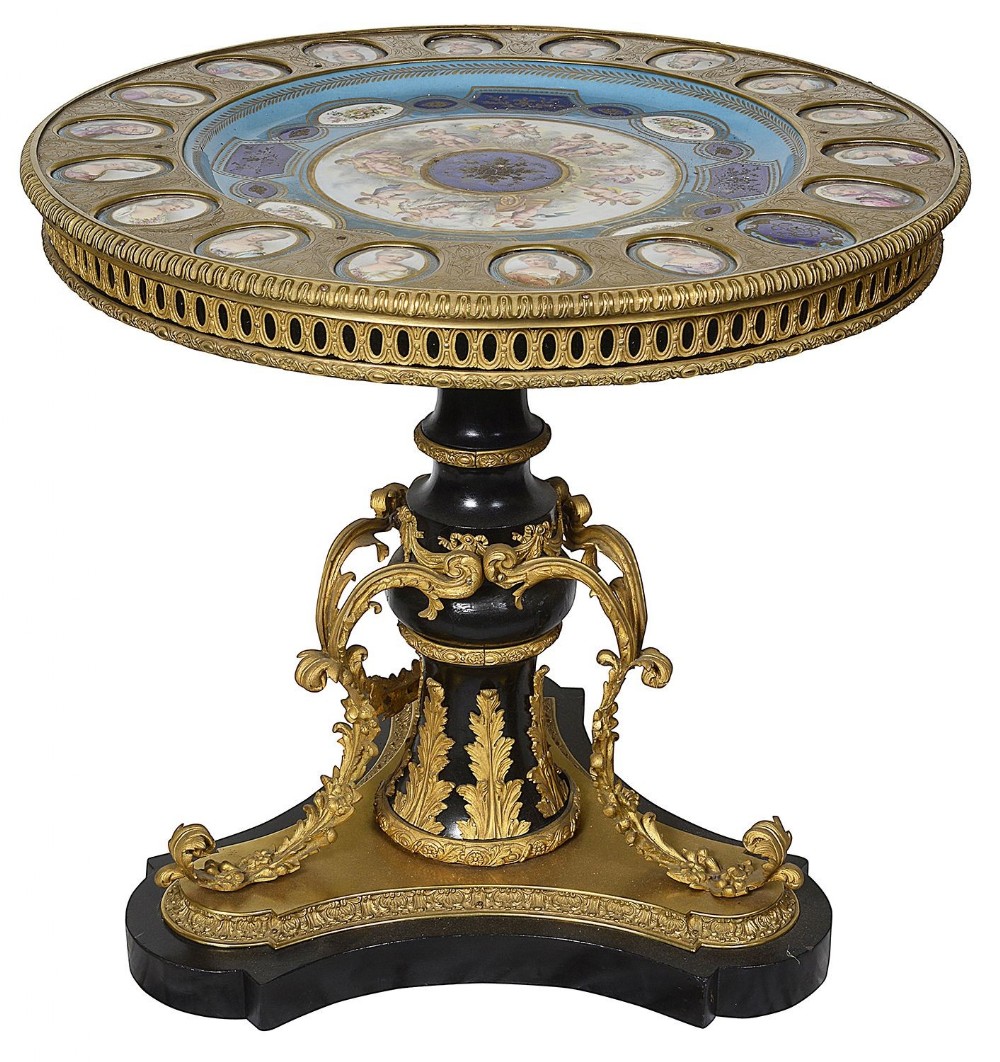 A circular Sevres style centre table featuring hand-painted porcelain portrait plaques, gilt-bronze mounts, and an ebonised tripod base.