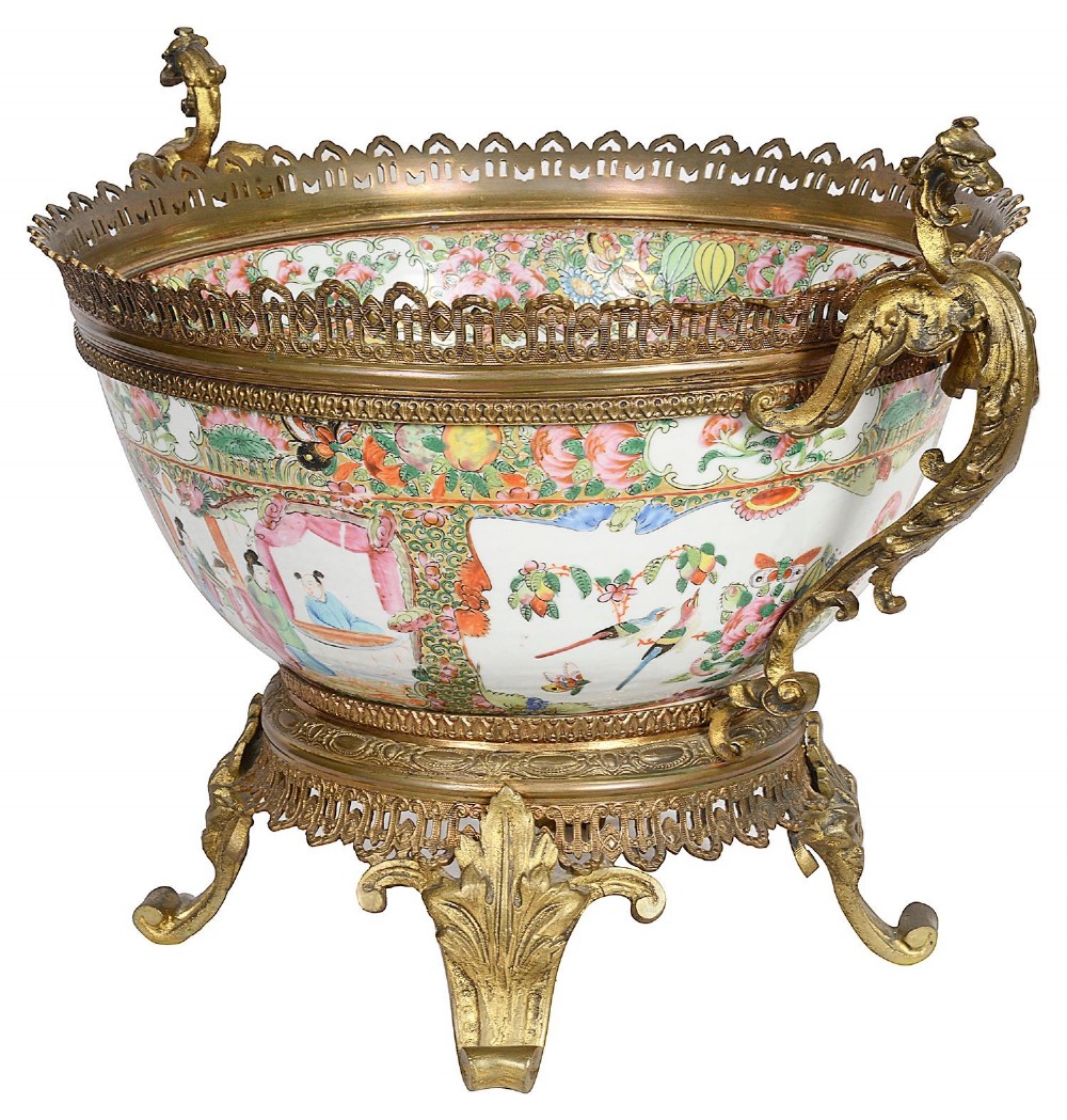 A nineteenth-century Cantonese Rose Medallion porcelain bowl held within ornate gilt-bronze ormolu mounts featuring mythical beast handles and a pierced base. View III