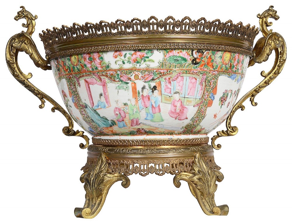 A nineteenth-century Cantonese Rose Medallion porcelain bowl held within ornate gilt-bronze ormolu mounts featuring mythical beast handles and a pierced base. View VIII
