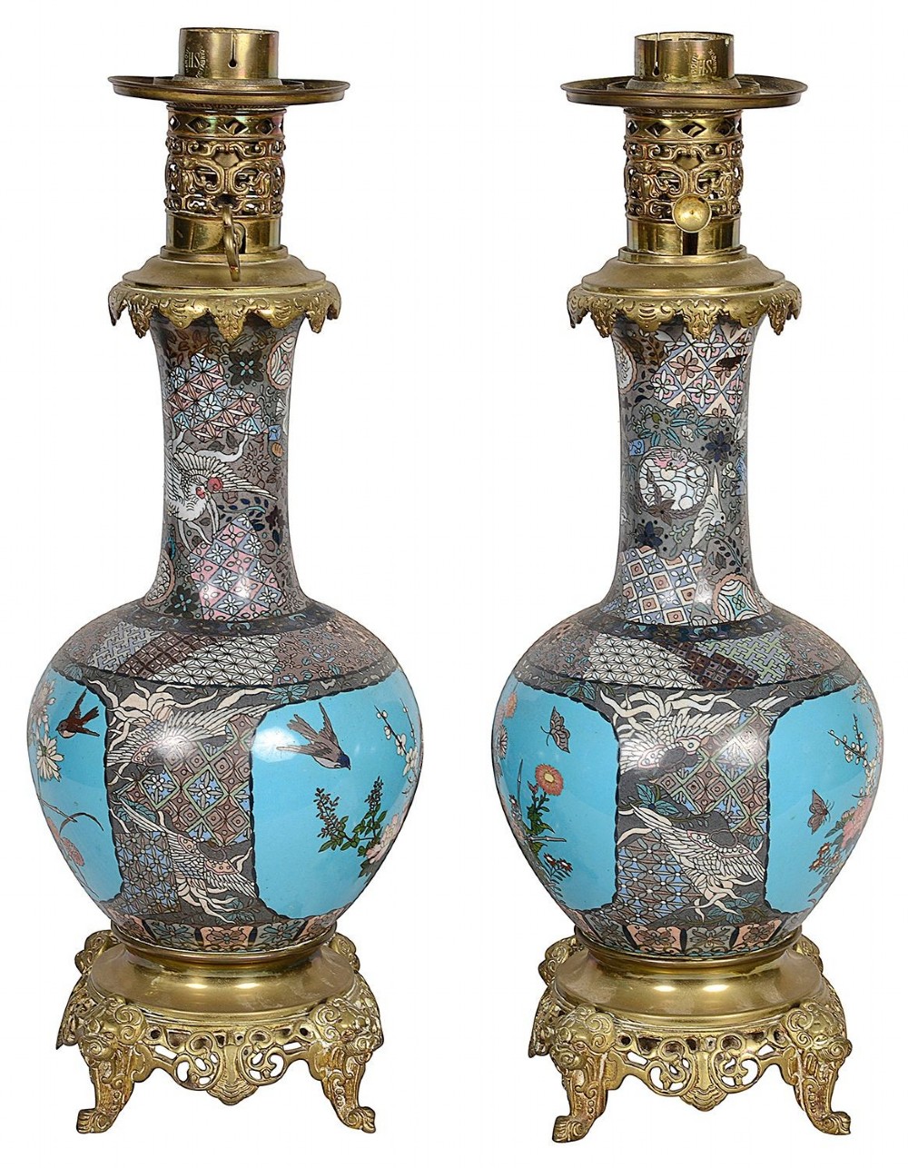 A pair of late nineteenth-century Japanese cloisonne table lamps with turquoise enamel floral bases, brass mounts, and cream pleated lampshades. View V