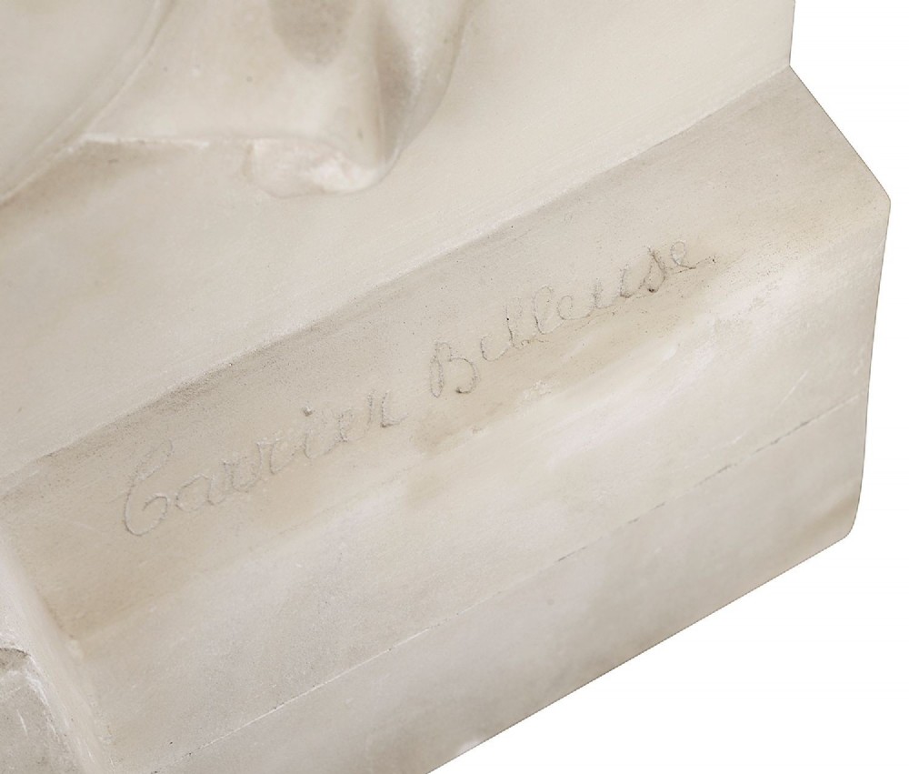 A carved white marble statue of a seated draped female musician playing a gilded lute on an integrated marble base. View IV