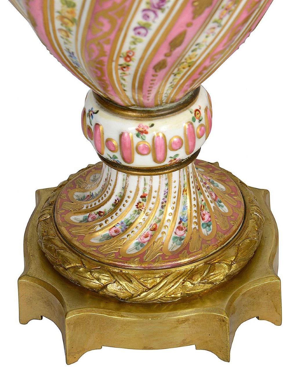 A pair of 19th-century French Sevres style pink and white porcelain lidded vases featuring hand-painted floral stripes and gilt decoration on square bases. View II