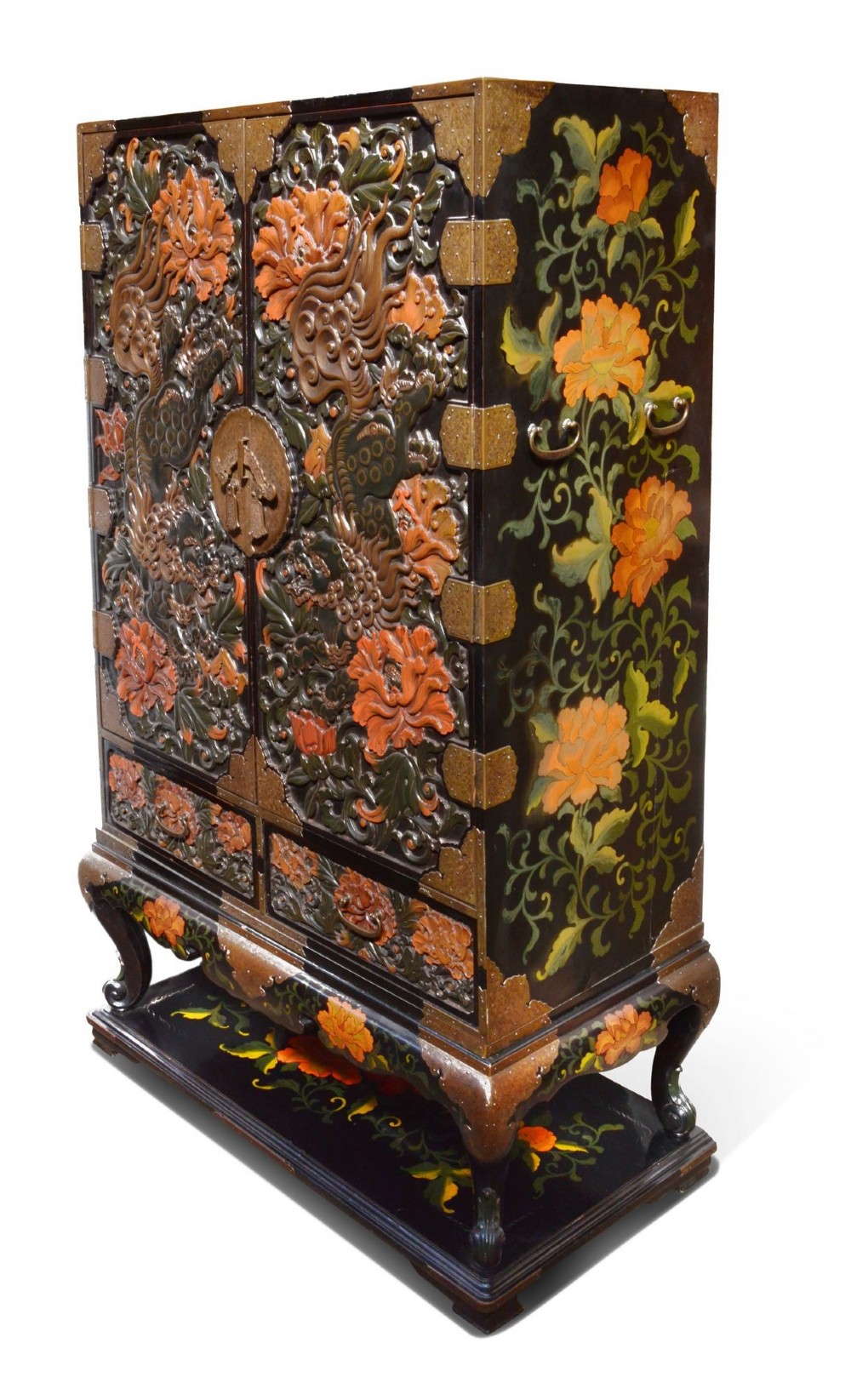 A late nineteenth-century black and polychrome carved lacquer cabinet featuring relief peony and dragon motifs, fitted brass hardware, and a matching stand base. View III