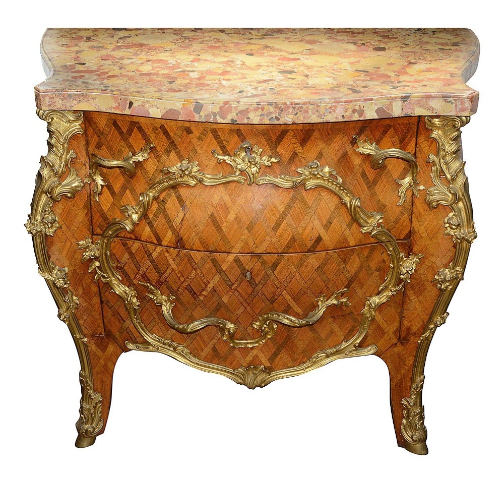 A pair of French eighteenth-century style bombe commodes with geometric wood parquetry, intricate gilt-bronze mounts, and variegated marble tops. View VII