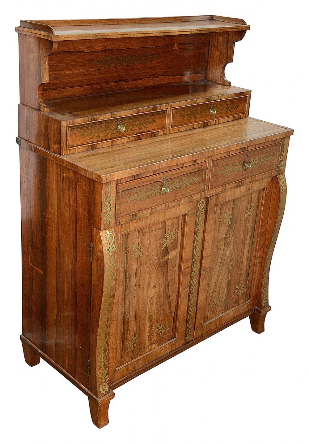 A Regency period warm brown timber chiffonier featuring intricate brass scrollwork inlay, a raised shelf gallery with two small drawers, and a two-door lower cabinet.