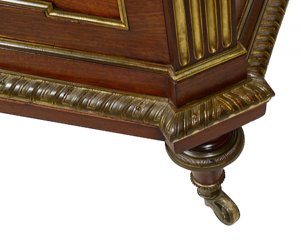 A rectangular French Louis XVI style mahogany cellarette featuring fluted corner columns, ornate brass egg-and-dart moulding, and tapered turned legs with castors. View VII