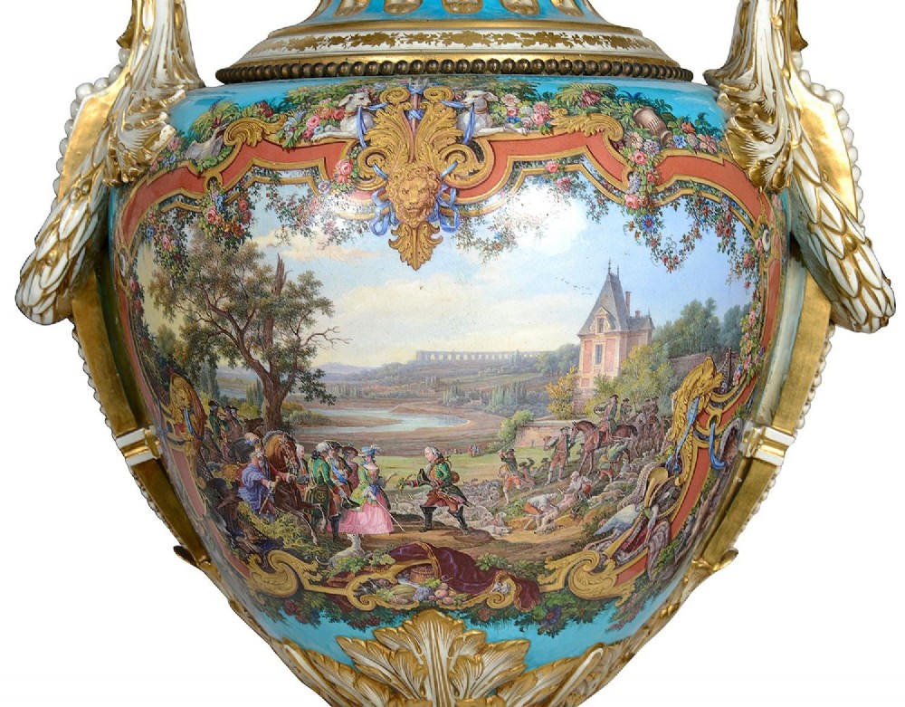 A pair of turquoise blue Sevres-style porcelain urns featuring hand-painted pastoral scenes, gilded scroll handles, and pineapple finials on square metal bases. View III
