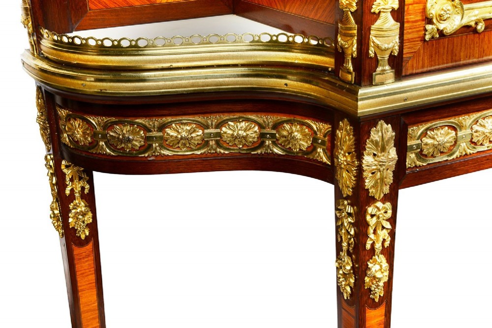 A Louis XVI style secretaire abattant featuring fine wood parquetry, elaborate gilt-bronze ormolu mounts, side display shelves, and a central turquoise porcelain floral plaque. View VIII