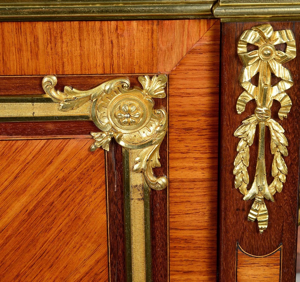 A Louis XVI style secretaire abattant featuring fine wood parquetry, elaborate gilt-bronze ormolu mounts, side display shelves, and a central turquoise porcelain floral plaque. View IX