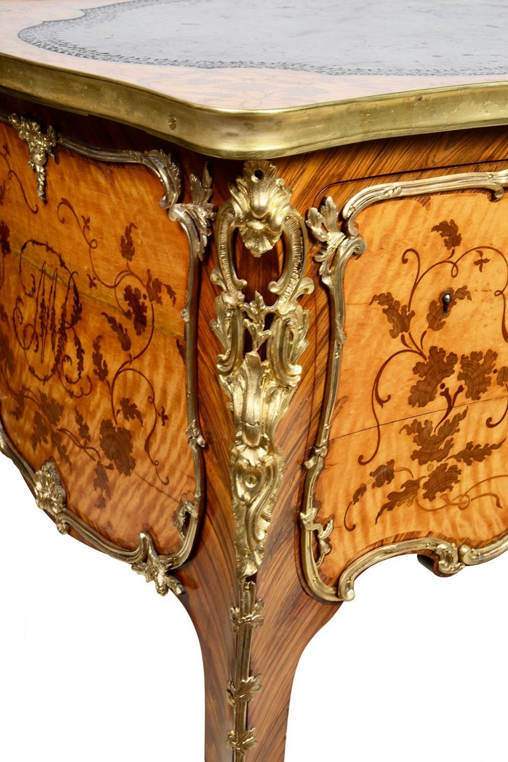 A 19th-century French Rococo Revival marquetry bureau de dame featuring floral timber inlays, serpentine edges, leather inset top, and gilt-bronze mounts on cabriole legs. View IV