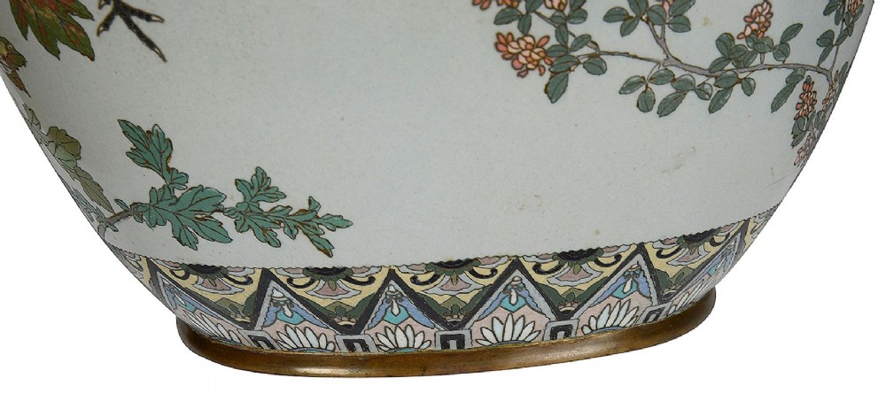 A pair of Japanese cloisonne enamel vase table lamps decorated with cranes and floral motifs on a light blue ground with cream pleated shades. View IV