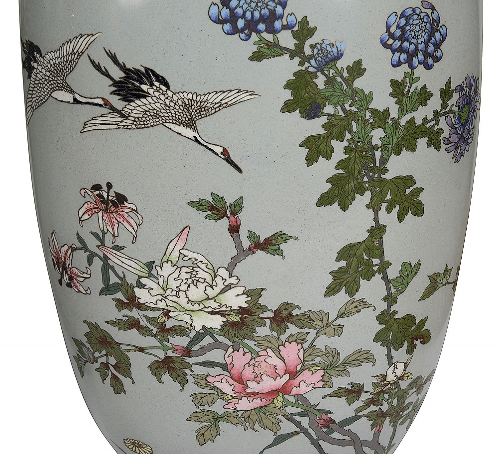 A pair of Japanese cloisonne enamel vase table lamps decorated with cranes and floral motifs on a light blue ground with cream pleated shades. View X