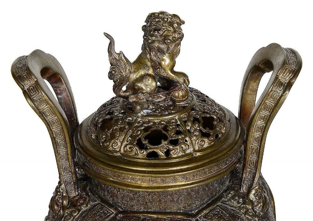 A pair of ornate antique Japanese Meiji period bronze lidded censers featuring dragon bases, relief panels, and shishi lion finials. View III