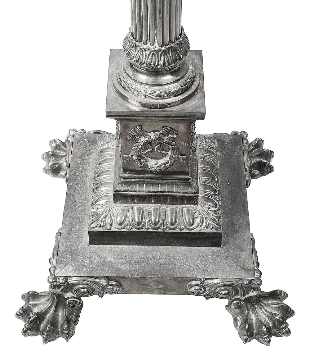 A silver-plated standard lamp featuring a fluted Corinthian column stem, an ornate square base with paw feet, and a beige fabric shade. View III