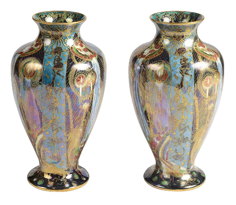 A pair of baluster-shaped Wedgwood Fairyland Lustre vases featuring the Candlemas pattern with iridescent blue background and elaborate gold gilding. View III