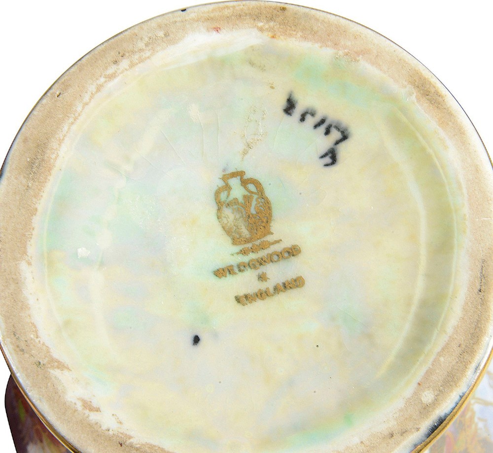 A pair of baluster-shaped Wedgwood Fairyland Lustre vases featuring the Candlemas pattern with iridescent blue background and elaborate gold gilding. View V