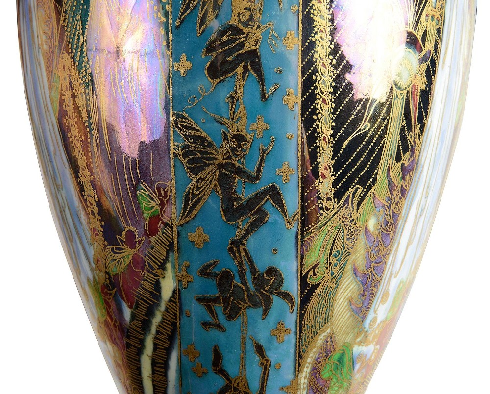 A pair of baluster-shaped Wedgwood Fairyland Lustre vases featuring the Candlemas pattern with iridescent blue background and elaborate gold gilding. View VI