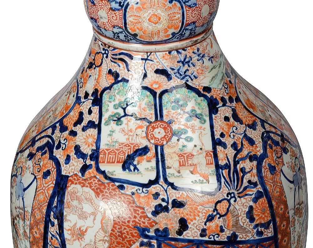 A tall Japanese Imari porcelain floor vase featuring a flared wavy rim, decorated with cobalt blue and orange enamel floral panels. View VI
