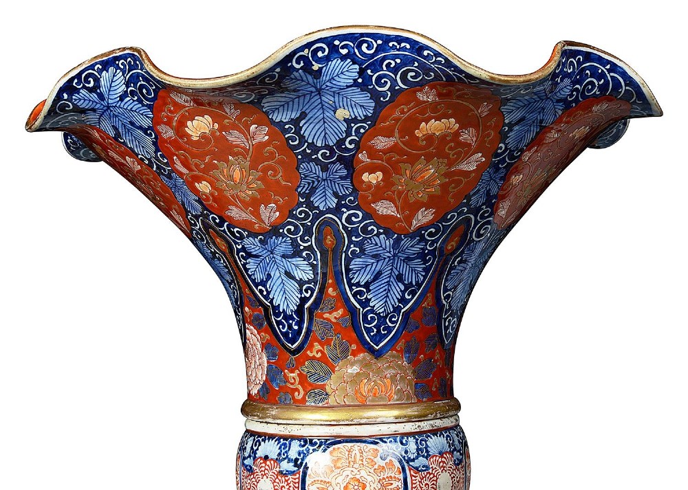 A tall Japanese Imari porcelain floor vase featuring a flared wavy rim, decorated with cobalt blue and orange enamel floral panels. View VII