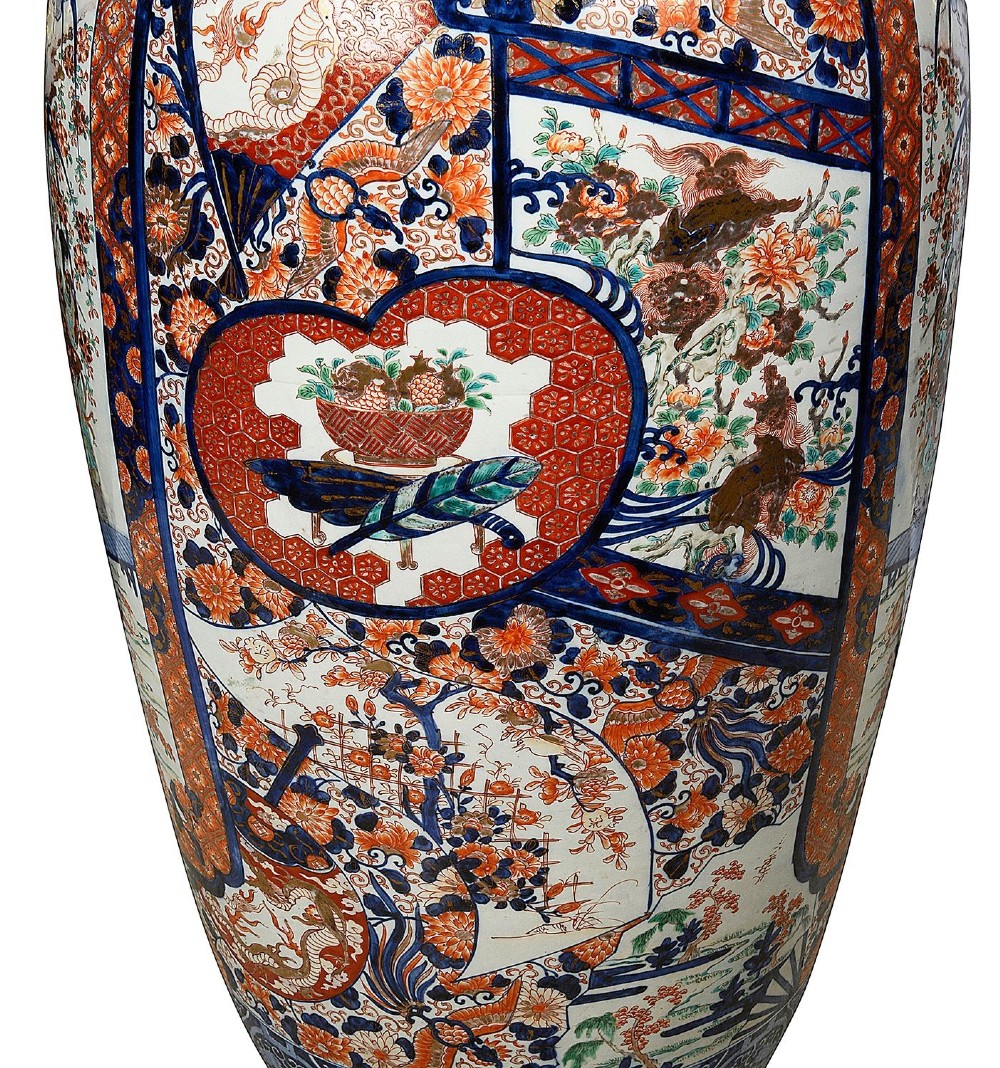 A tall Japanese Imari porcelain floor vase featuring a flared wavy rim, decorated with cobalt blue and orange enamel floral panels. View VIII