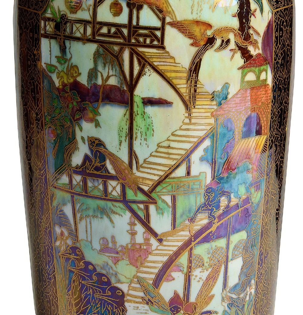 A tall Art Deco porcelain vase featuring iridescent lustre glazing, fairy tale illustrations, and intricate gold architectural borders. View VI