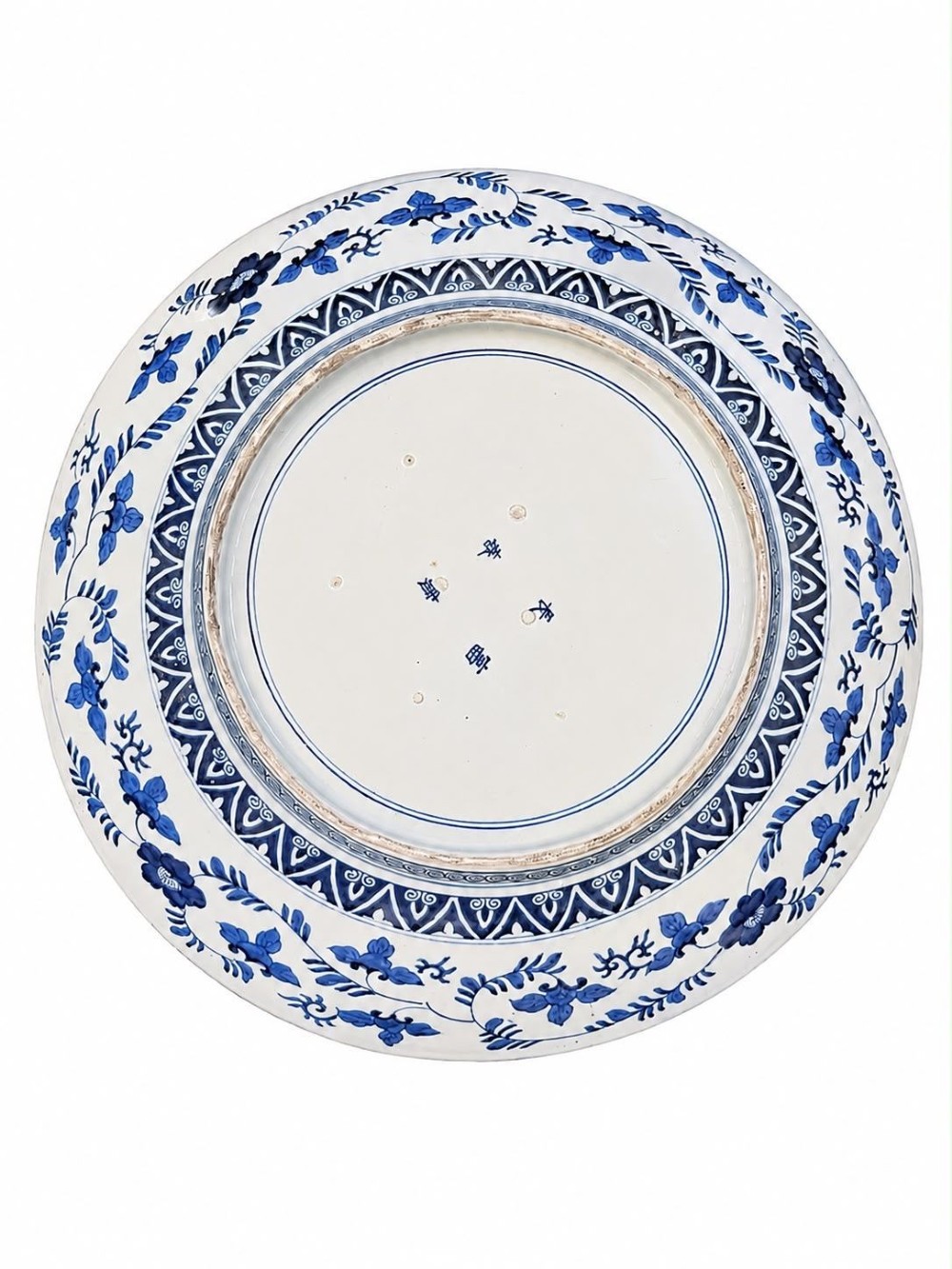 A large 19th-century Japanese Imari porcelain charger featuring hand-painted samurai panels and floral medallions in rust red, blue, and gold. View VI