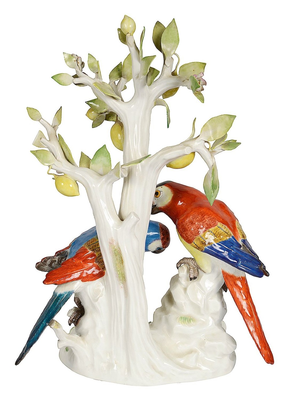 A 19th-century Meissen porcelain sculpture featuring two colourful parrots perched beneath a lemon tree with yellow fruit and green leaves. View IV