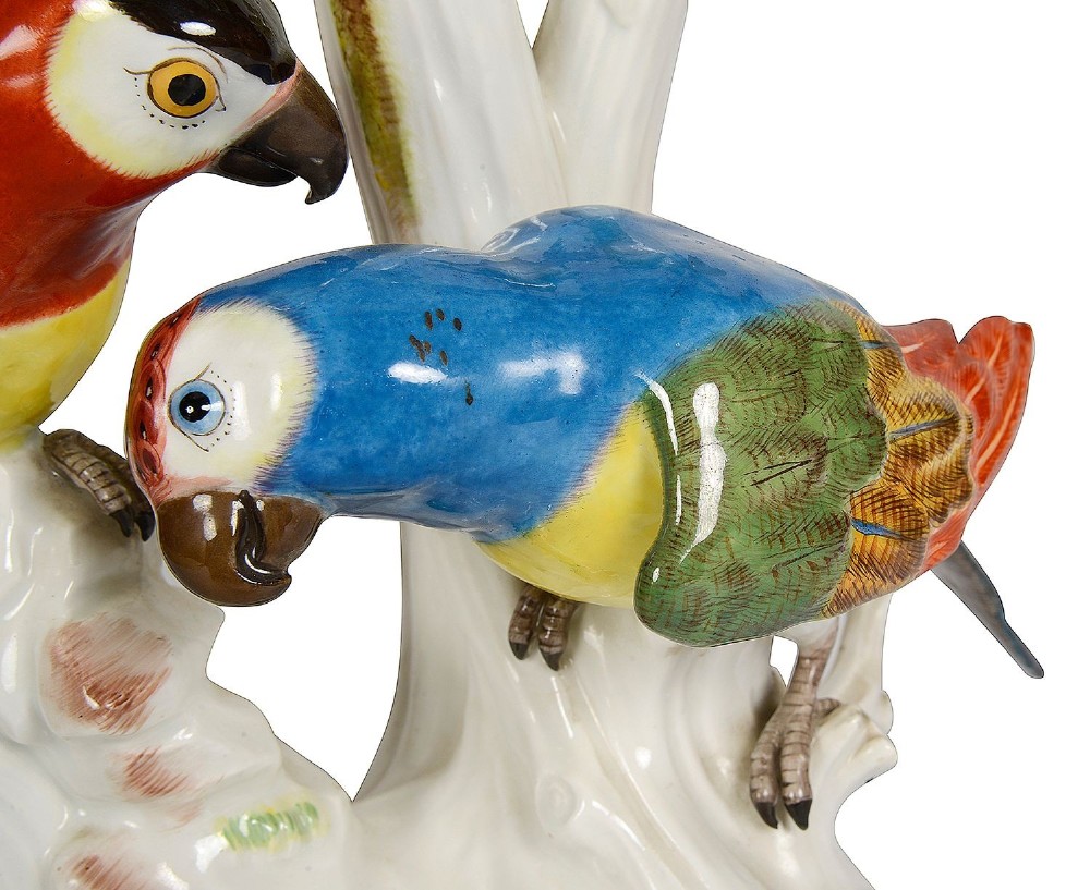 A 19th-century Meissen porcelain sculpture featuring two colourful parrots perched beneath a lemon tree with yellow fruit and green leaves. View VIII