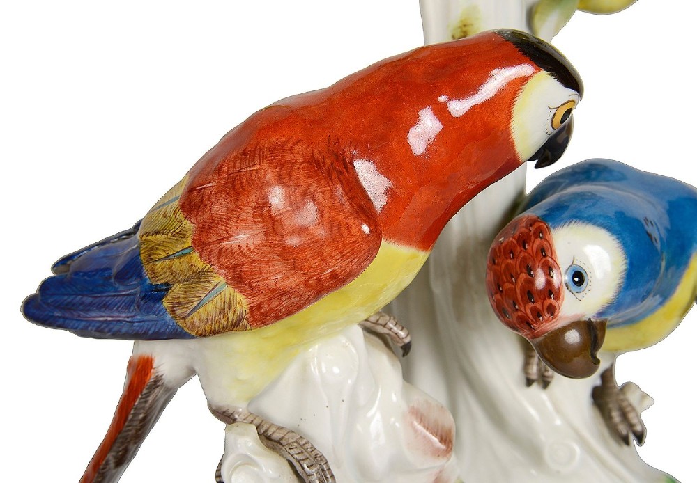 A 19th-century Meissen porcelain sculpture featuring two colourful parrots perched beneath a lemon tree with yellow fruit and green leaves. View IX