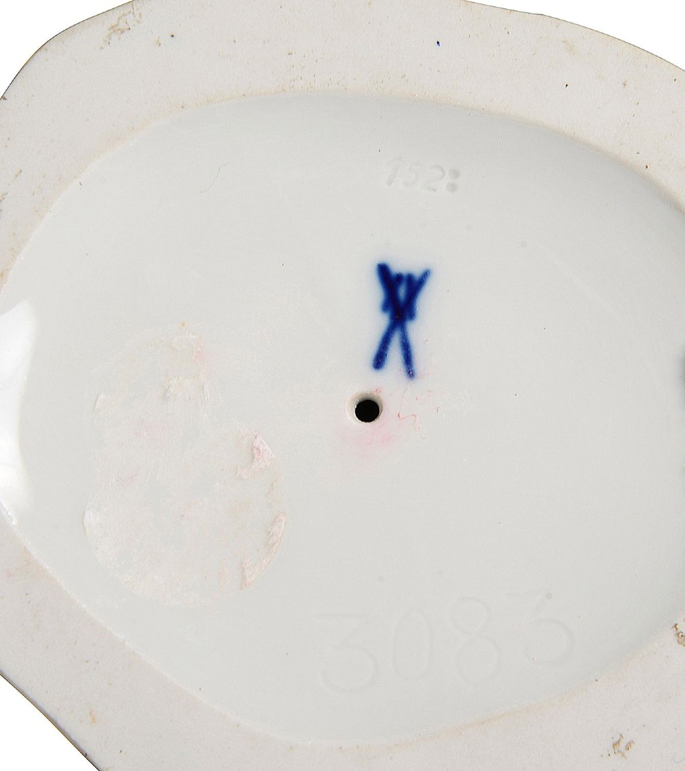 A late 19th-century Meissen hard-paste porcelain figurine depicting a brightly enamelled parrot perched on a tree stump base. View VII