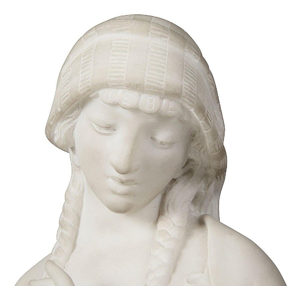 A 19th-century carved white marble sculpture depicting a standing young girl dressed in traditional draped garments and a patterned headscarf on an integrated base. View II