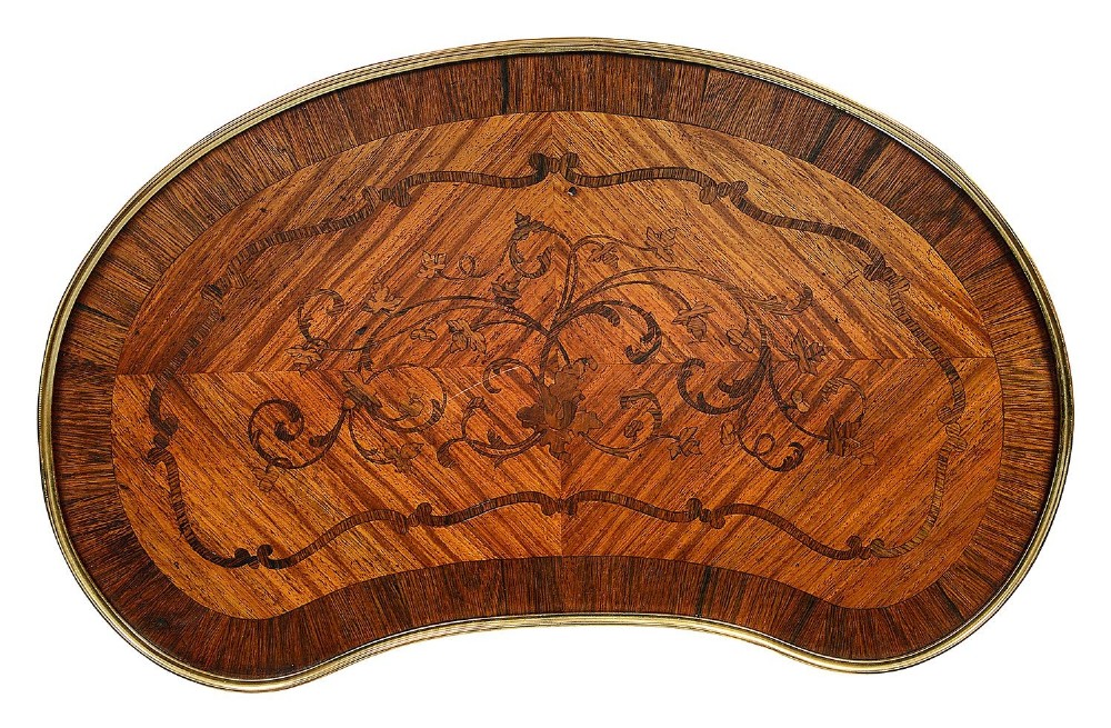 A kidney-shaped French marquetry side table featuring cabriole legs, an lower tier shelf, and metal edge mounts. View III