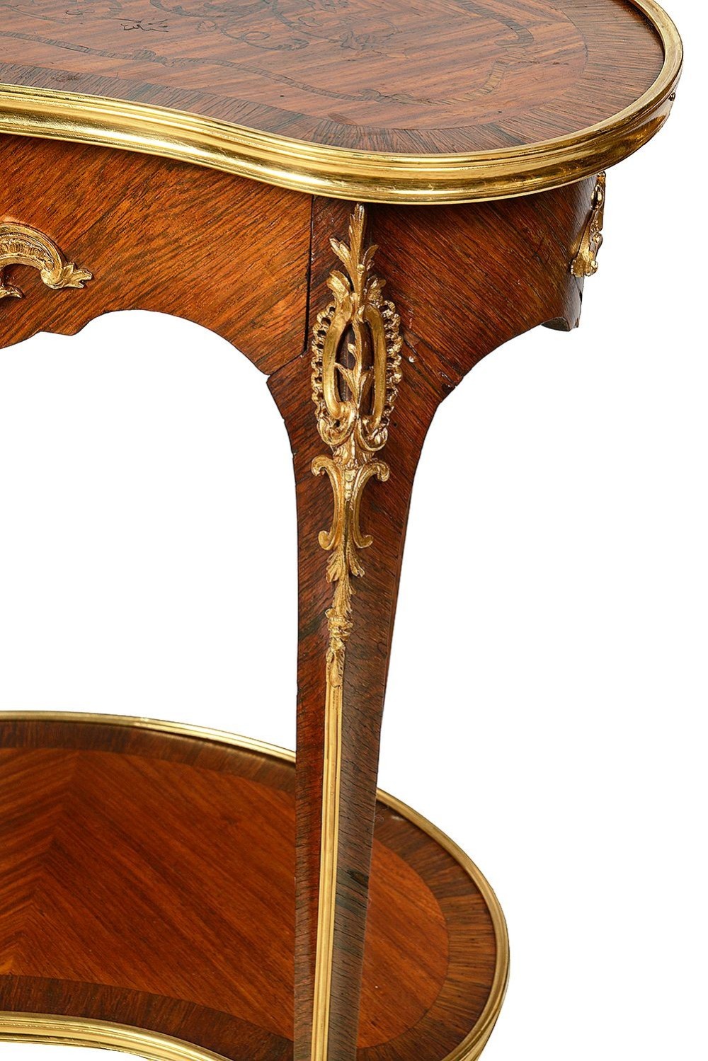 A kidney-shaped French marquetry side table featuring cabriole legs, an lower tier shelf, and metal edge mounts. View IV