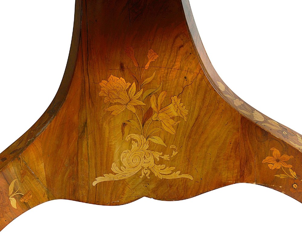 A circular Victorian walnut centre table featuring radial segment veneers, intricate floral marquetry, and a carved pedestal base with scroll feet. View VII